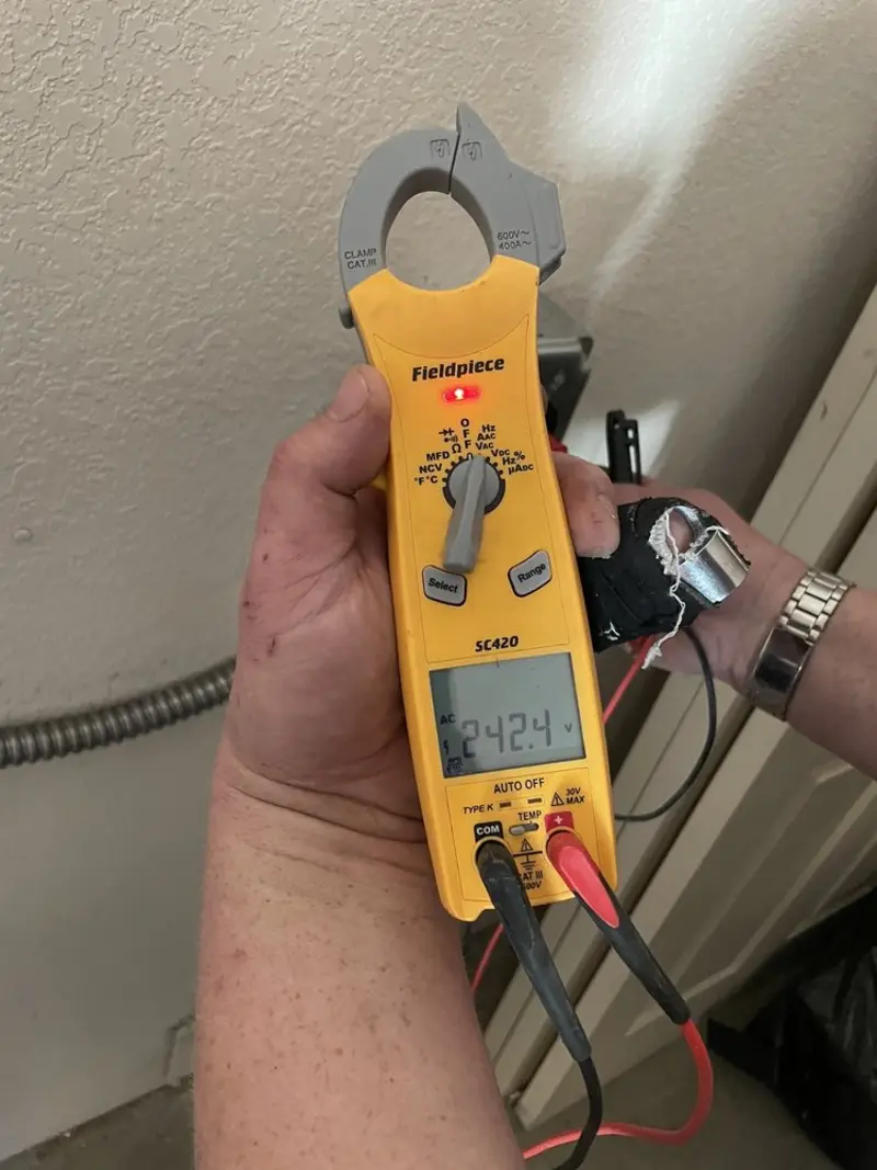Voltage testing with clamp meter during Generator Installation in Calistoga